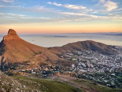 Hikers on the rocky upper trail of Lion's Head
